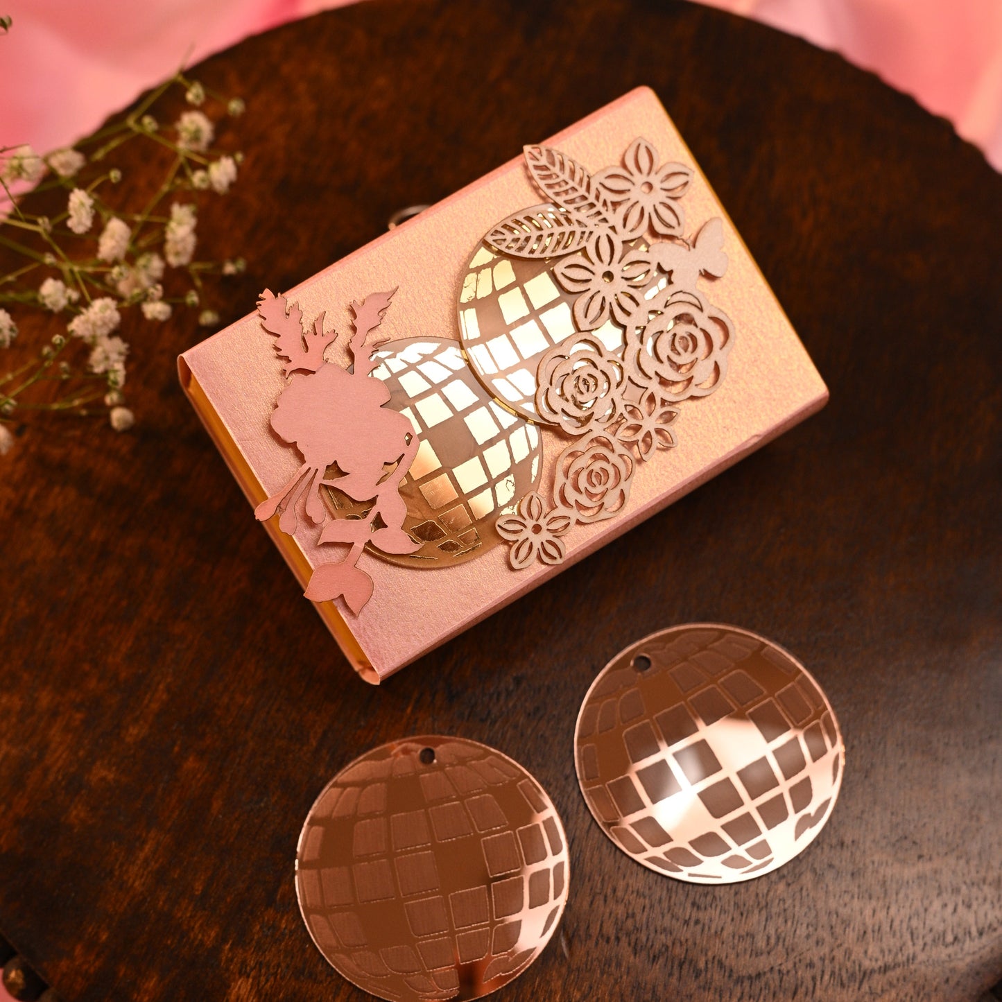 retro themed coin box with acrylic disco balls and floral detailing