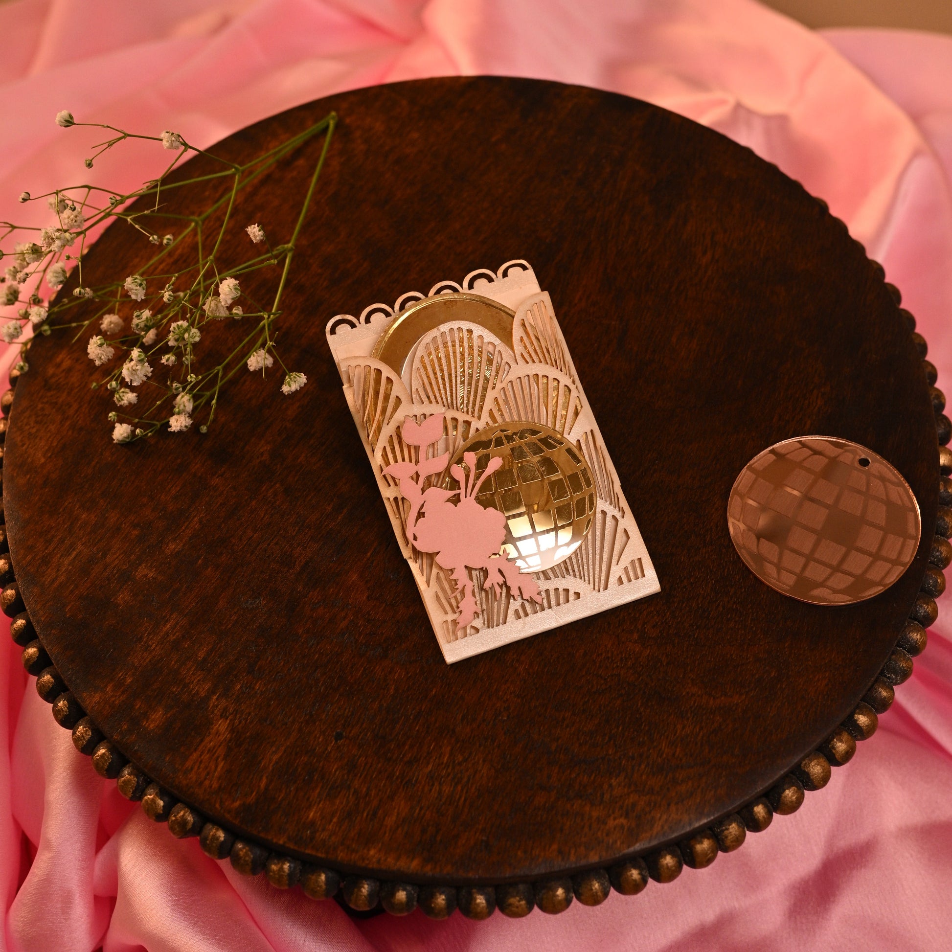 retro themed coin pocket hlders with disco ball made out of acrylic sheet and flower motifs
