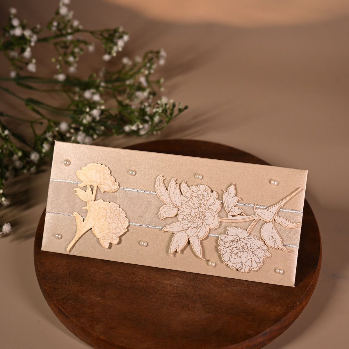 silver floral envelope