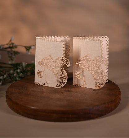 gift tag featuring laser cut squirrel design with intricate detailing inside it