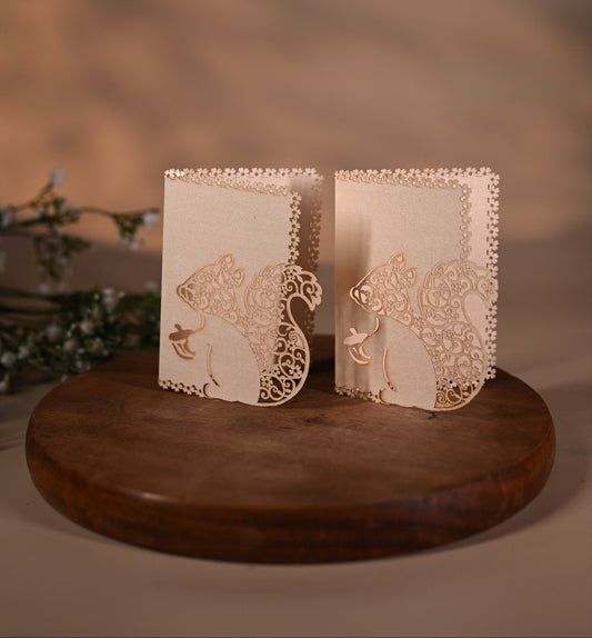 gift tag featuring laser cut squirrel design with intricate detailing inside it