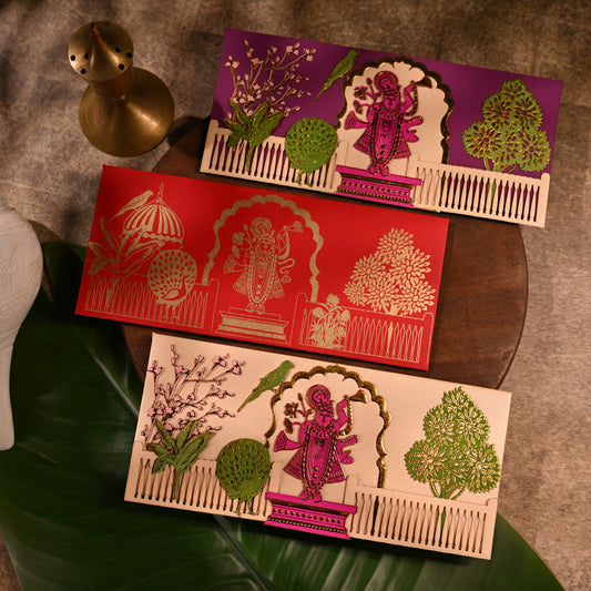 envelope featuring intricate aser cut design and shree nathji