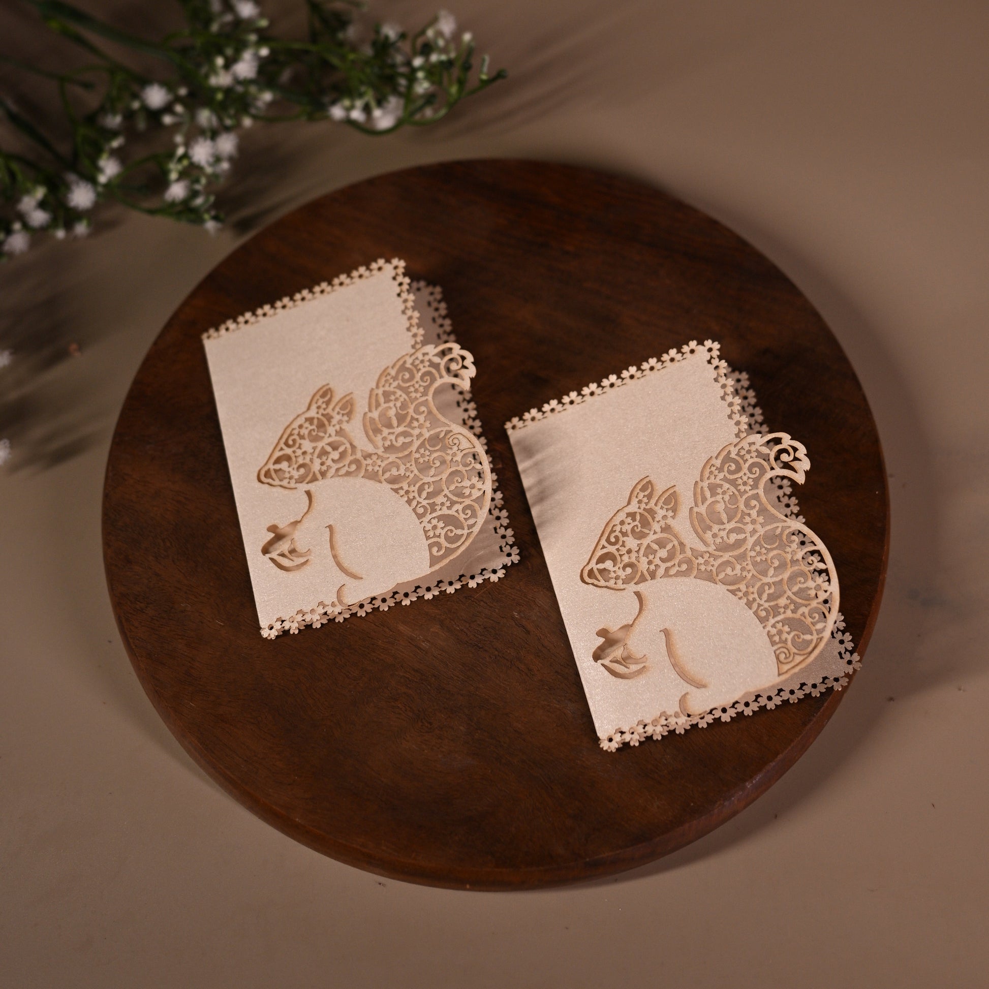 gift tag featuring laser cut squirrel design with intricate detailing inside it