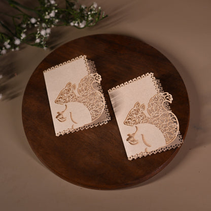 gift tag featuring laser cut squirrel design with intricate detailing inside it