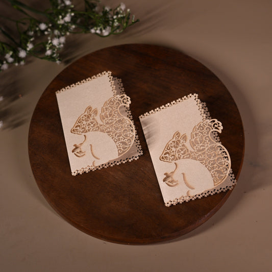 gift tag featuring laser cut squirrel design with intricate detailing inside it
